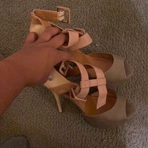 Grey, Nude, and cream open toed heels. About 5” high. Perfect for going out.